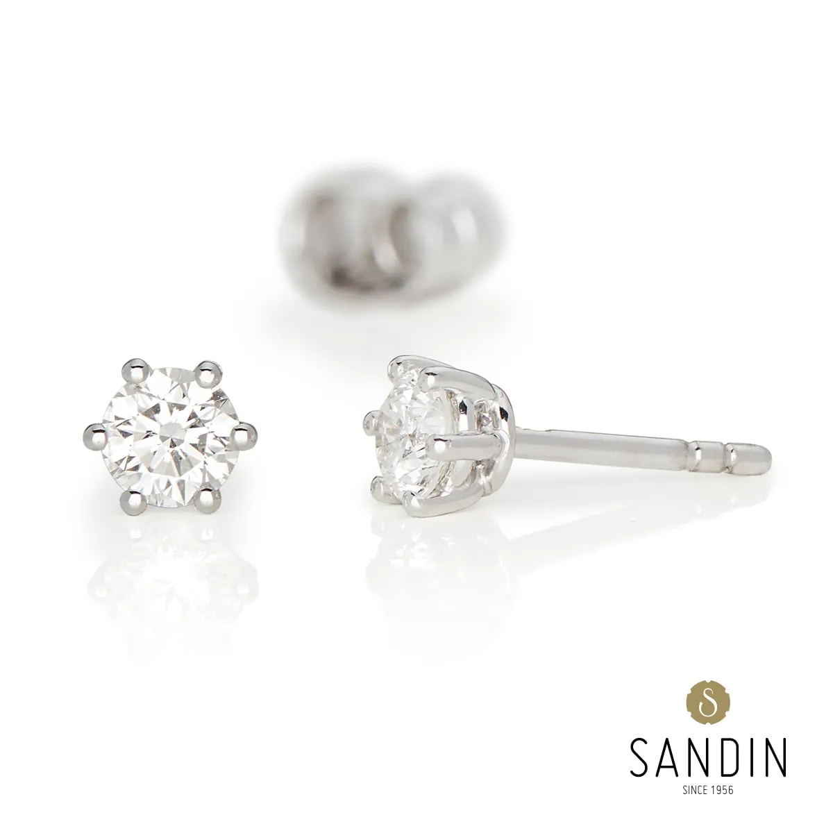 Sandin_1956_Light_Solitaire_o%CC%88rha%CC%88nge_vg_2x0-30ct_hos_Jarl_Sandin
